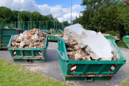 dumpster with concrete in different sizes